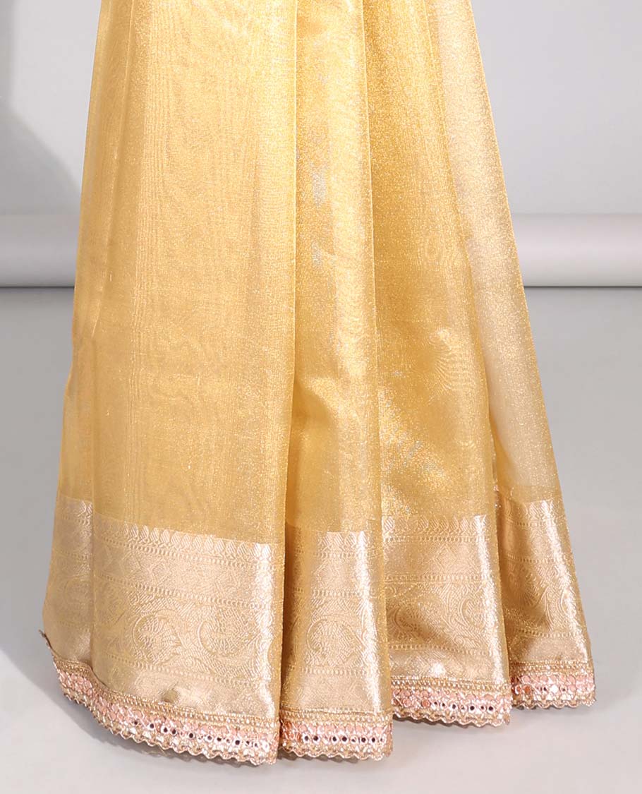 Yellow tissue saree with self zari design border & intricate zari design pallu