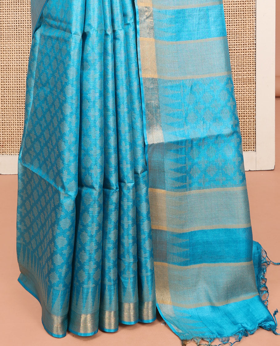 Blue Tussar Silk Saree, Subtly Sparkled with Buttas, a Subtle Temple Border, Pallu Features Stripes and Buttas, and a Matching Blouse