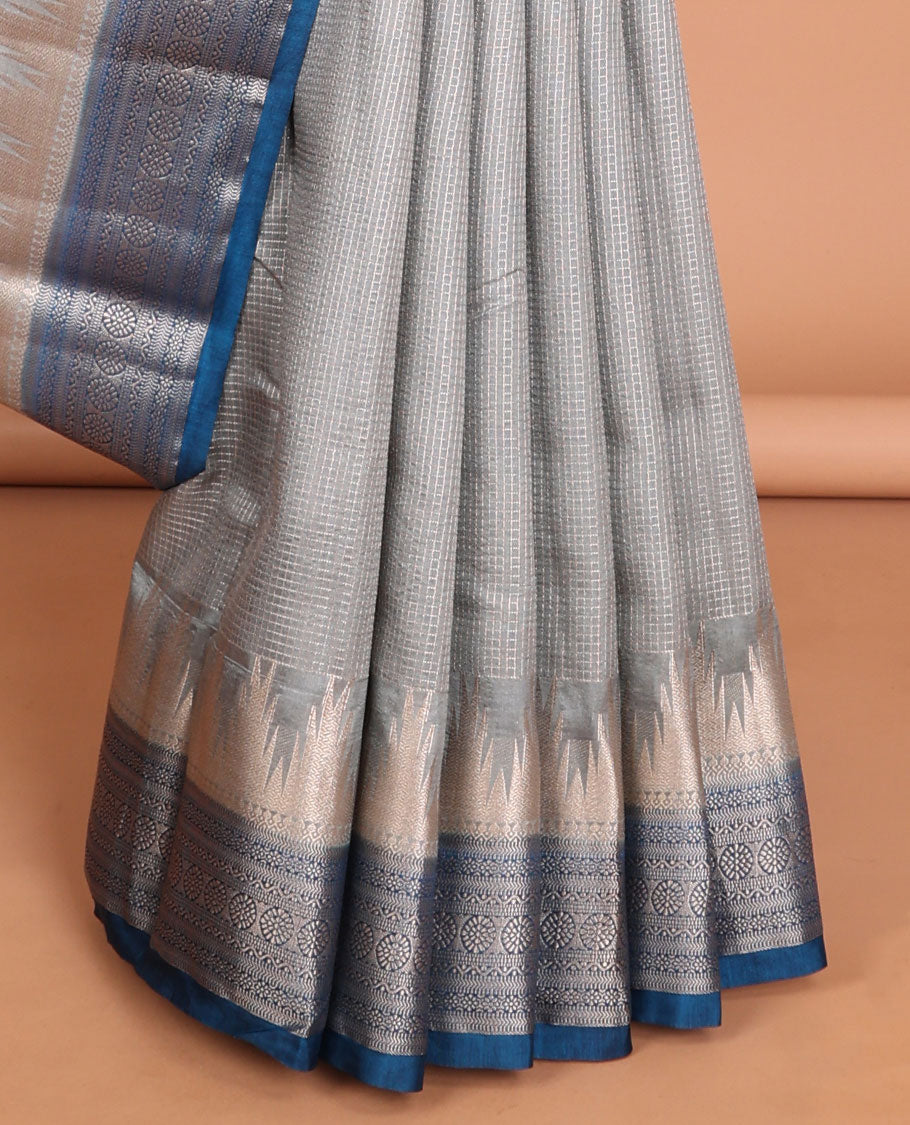 Light grey checked tussar saree with contrast traditional zari design border & chevron design pallu