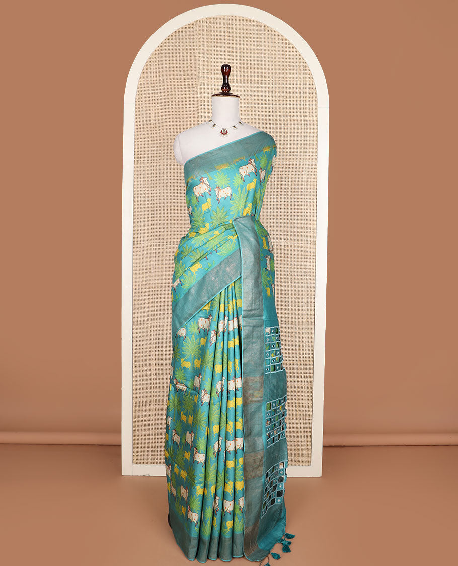Blue tree and Pichwai cow printed tussar silk saree, bavanji border, and checked pallu