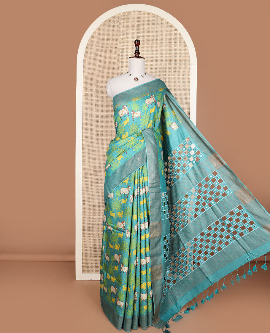 Blue tree and Pichwai cow printed tussar silk saree, bavanji border, and checked pallu