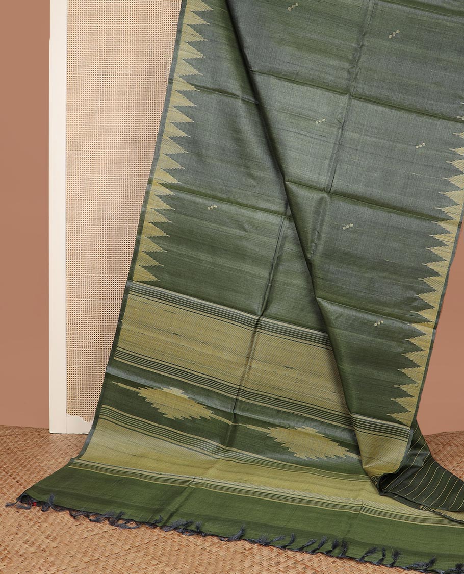 Green buttas tussar silk saree, temple border and pallu of stripes and temple motifs