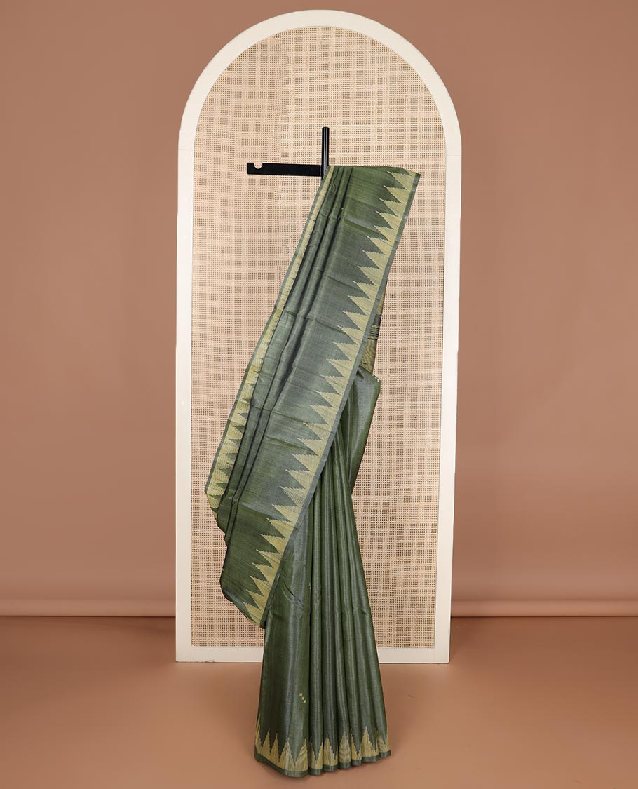 Green buttas tussar silk saree, temple border and pallu of stripes and temple motifs