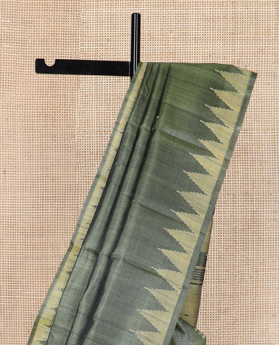 Green buttas tussar silk saree, temple border and pallu of stripes and temple motifs