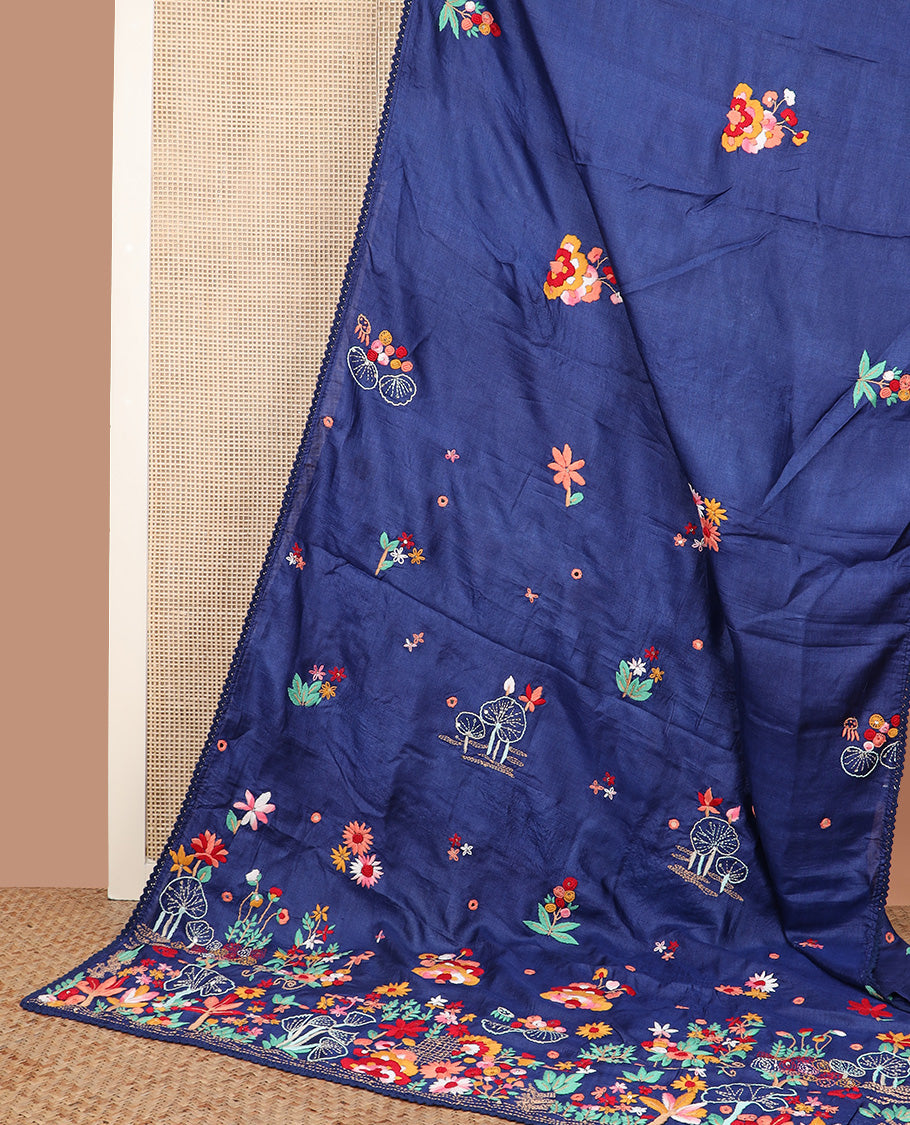 Borderless ink blue base tussar saree with kaleidoscopic-colored thread floral embroidery motifs