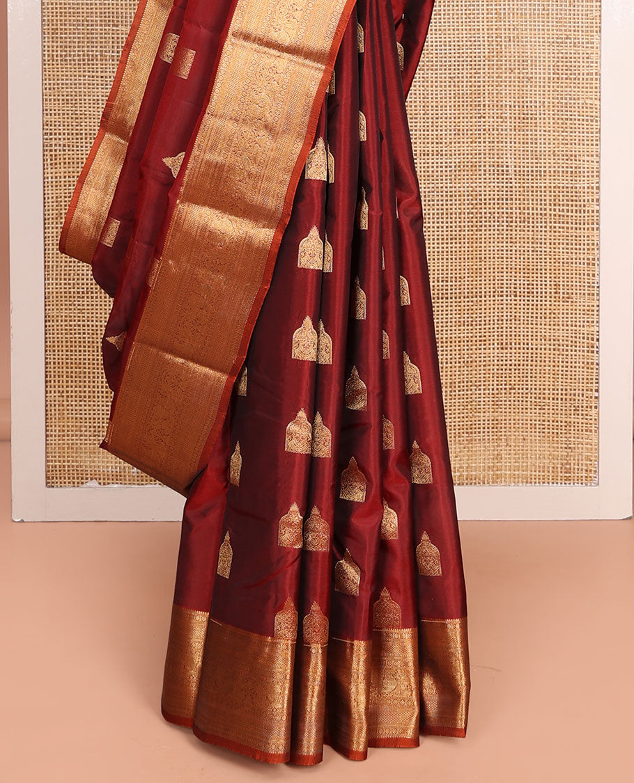 Maroon Vasundhara Lite-Silk Mix Saree, Detailed with Zari Buttas All Over Its Body, Highlighted by a Zari Border of Rekku, Kamalam, Kuyil Kann, Yaanai, and Mayil Designs, Grand Pallu of Jaal Designs, and Paired with a Contrast Blouse
