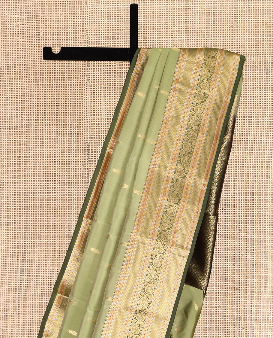 Green Vasundhara Lite Silk Mix Saree, Adorned with Zari Buttas, a Contrast Border of Rekku, Muthu, Kodi Visiry, and Mayil Kann, Jaal Pallu, and a Contrast Blouse