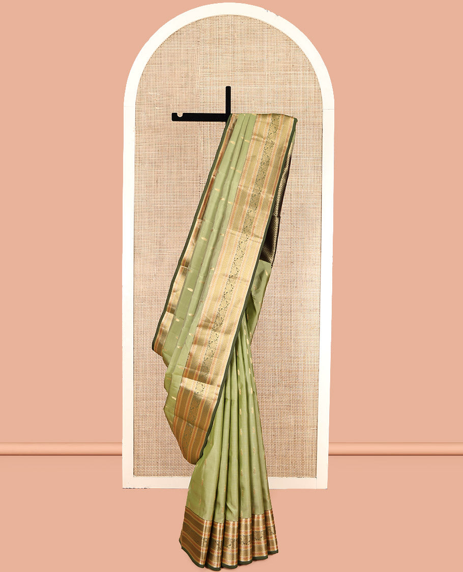 Green Vasundhara Lite Silk Mix Saree, Adorned with Zari Buttas, a Contrast Border of Rekku, Muthu, Kodi Visiry, and Mayil Kann, Jaal Pallu, and a Contrast Blouse
