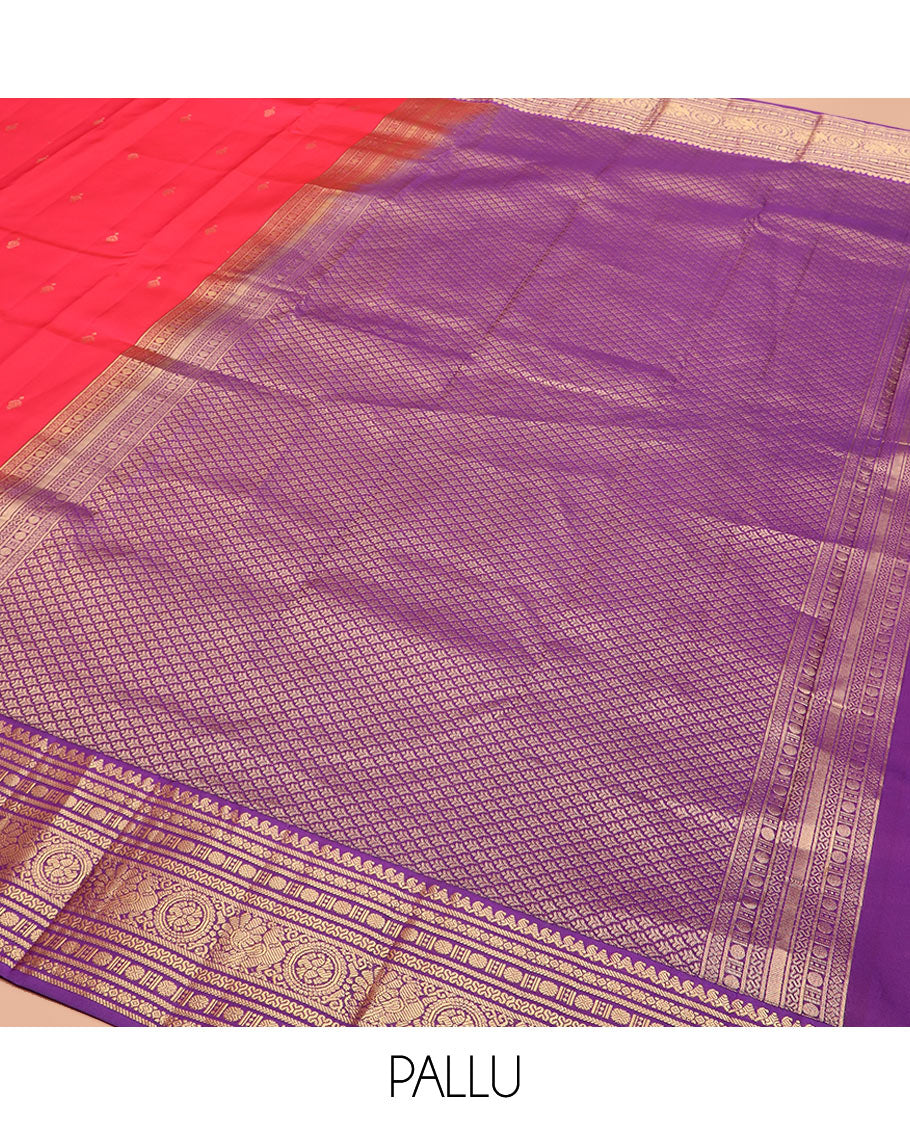 Red Vasundhara Silk Saree Adorned with Zari Buttas, Complemented by a Contrast Border of Thilakam Mokku, Banaras, Rudraksham, Kathir, Cross Neli, and Anna Chakram Designs, Pallu Decked Up with Jaal Designs, and Paired with a Contrast Blouse