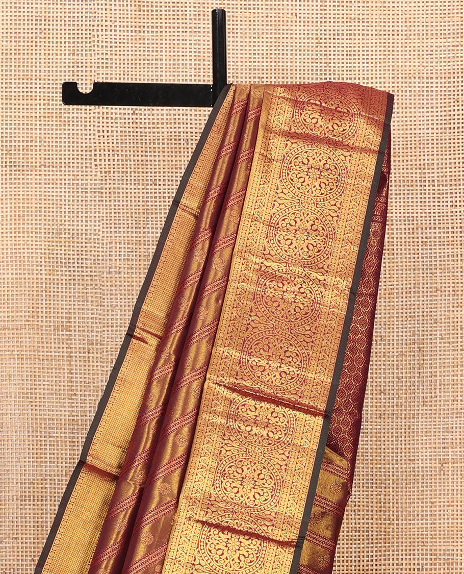 Maroon Kanchipuram Wedding Silk Saree, Mesmerized with Jacquard Design on Its Body, Highlighted by Zari Border of Thilakam Mokku, Rudraksham, Mayil Kann, and Chakram Designs, Grandly Woven Pallu, and Paired with a Matching Blouse