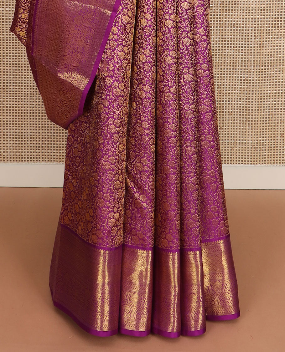 Purple floral jacquard Kanchipuram wedding silk saree, traditional zari border, and pallu of jaal design