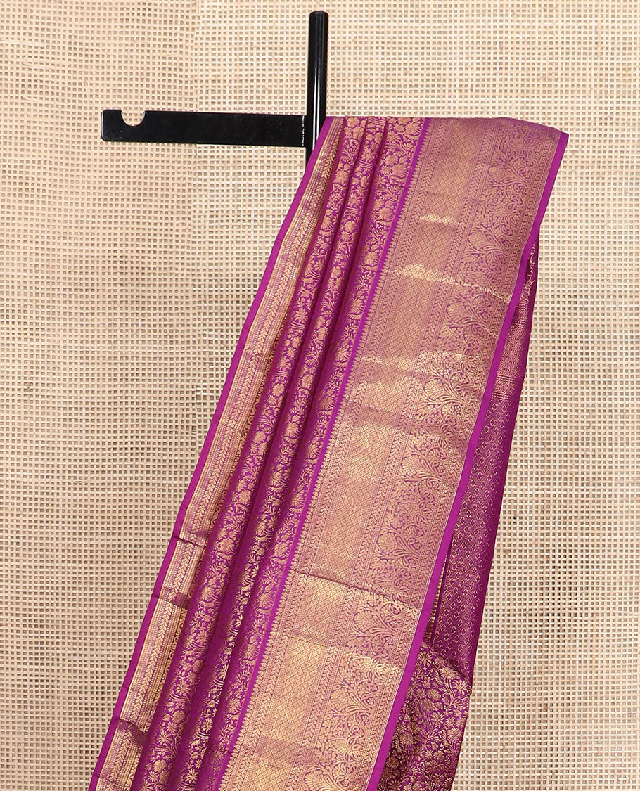 Purple floral jacquard Kanchipuram wedding silk saree, traditional zari border, and pallu of jaal design