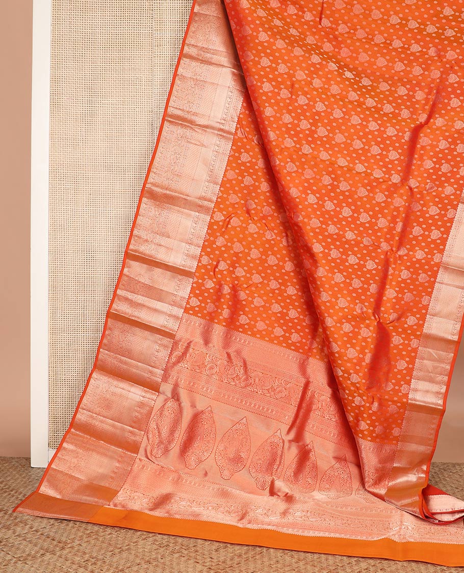Orange zari buttas Kanchipuram wedding silk saree, zari border of thilakam mokku, chakram, kathir, manga, kuyil kann, jaal ,and zari designs, and intricate pallu