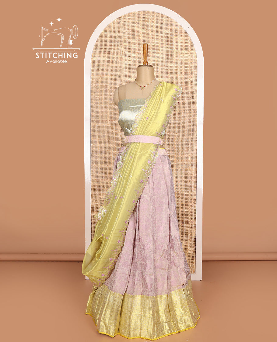 Pink art silk half-saree, floral vine with contrast traditional border skirt, brocade blouse, scallop embroidered dhavani, and detachable belt