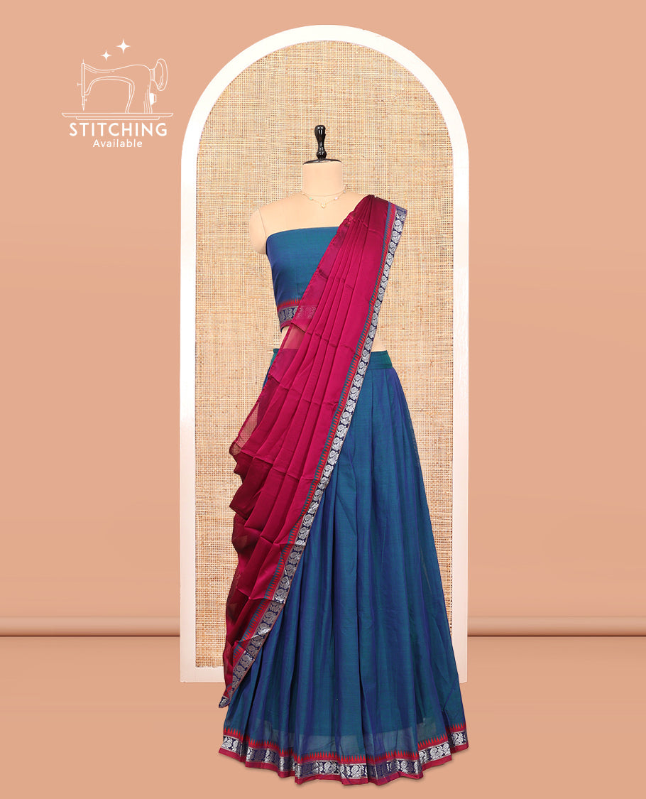 Blue Cotton Half-Saree Features Plain Skirt, a Contrast Peacock Temple Border, a Matching Blouse, and a Contrast Dhavani
