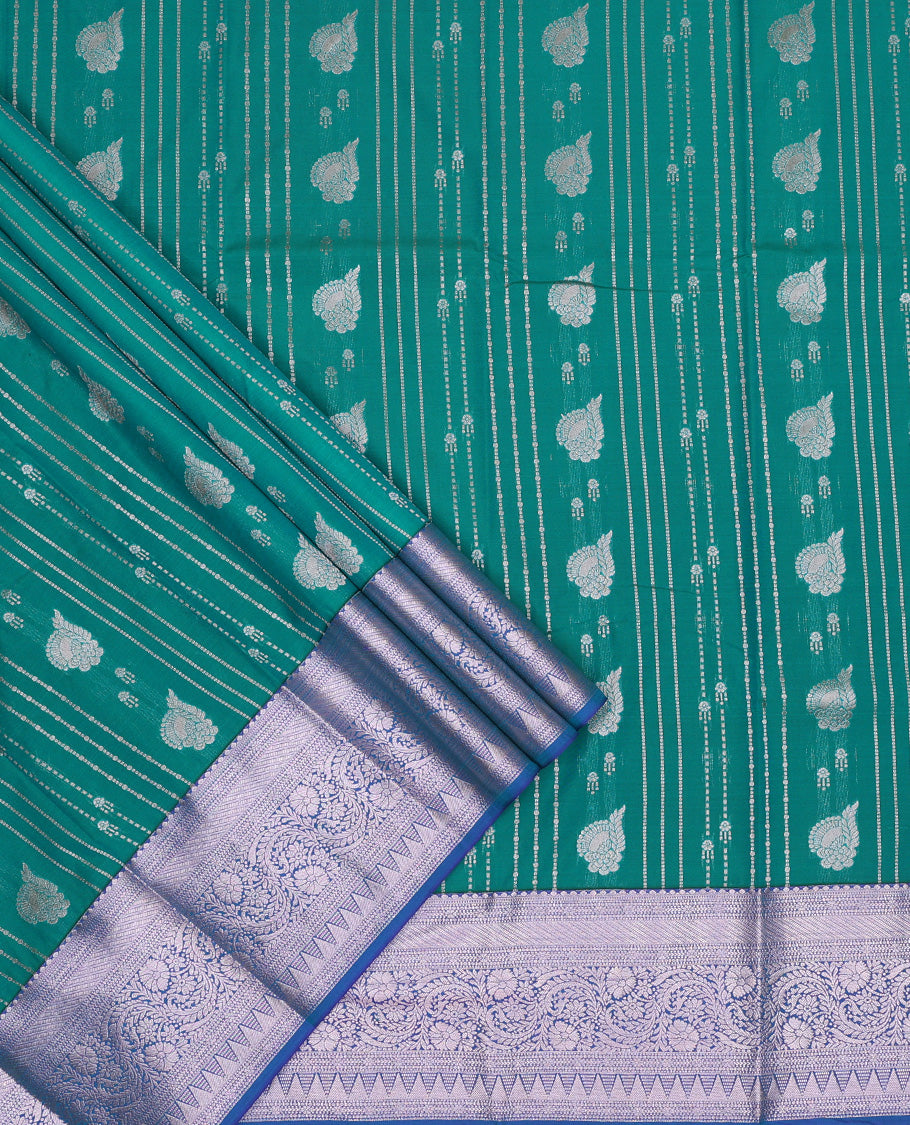 Green art silk pavadai set, zari design and contrast traditional zari bordered skirt and a contrast zari border blouse