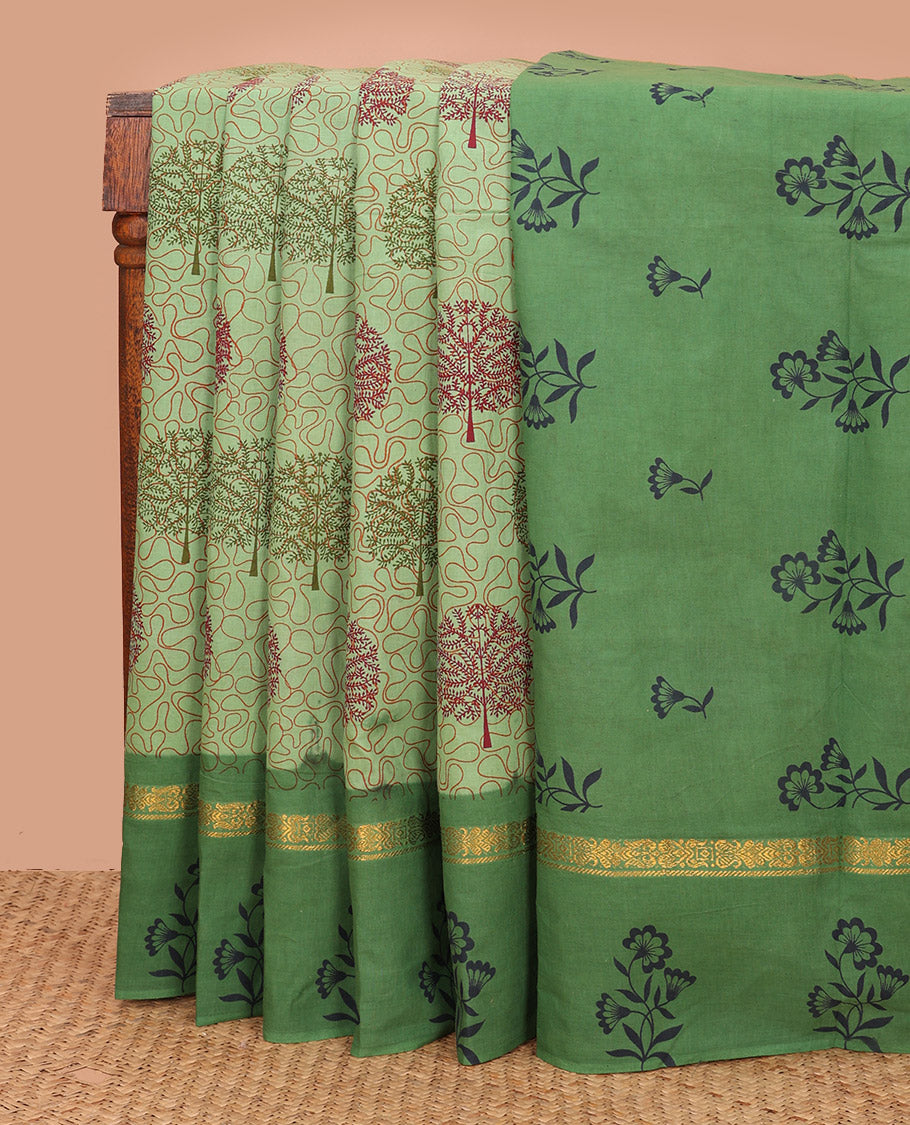 Green Sungudi Cotton Saree Decked Up with Tree Motifs and Vine Print, Highlighted by Contrast Zari and Print Work Border of Floral Print, and Pallu with Floral Print