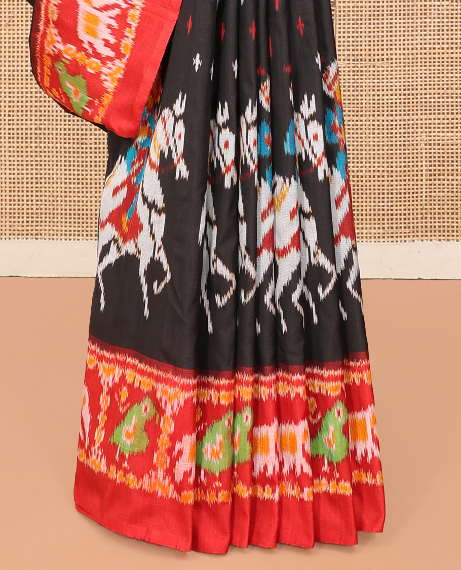 Black Pochampally Ikat Saree, Adorned with Buttas and Horse Rider Ikat Weave, a Contrast Ikat Animal Weave Border, Jaal Pallu, and a Contrast Blouse