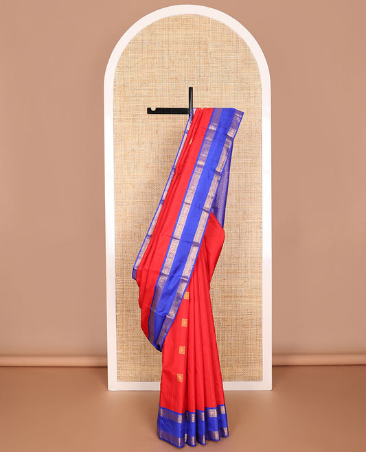 Red buttas kancheepuram silk saree with contrast rettai pettu border of poo chakram, mayil design & floral design pallu