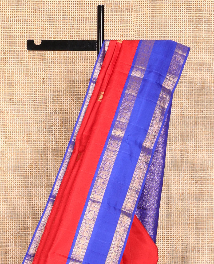 Red buttas kancheepuram silk saree with contrast rettai pettu border of poo chakram, mayil design & floral design pallu