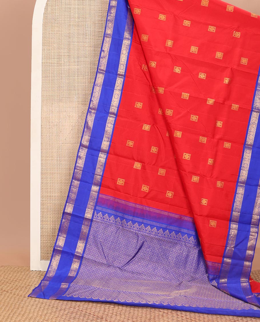 Red buttas kancheepuram silk saree with contrast rettai pettu border of poo chakram, mayil design & floral design pallu