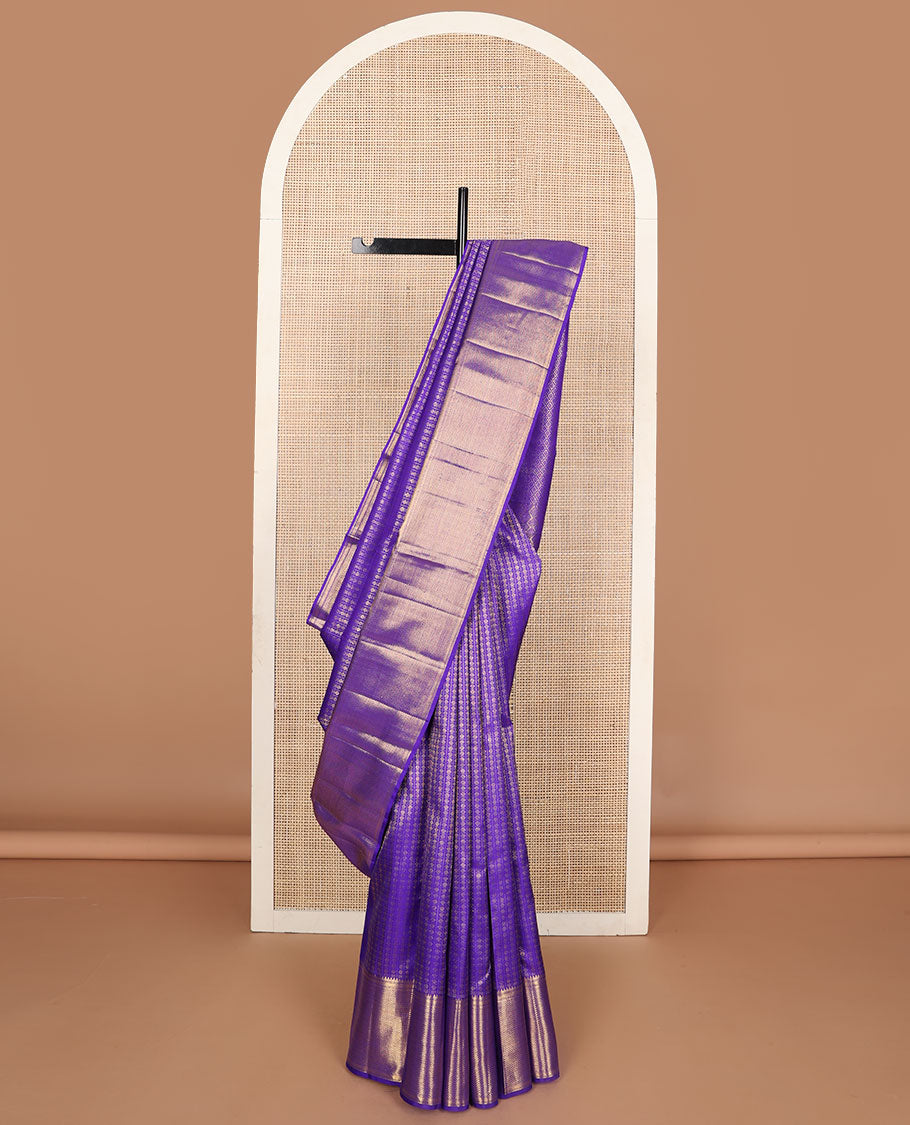 Blue jacquard silk saree, zari border of rekku, muthu, banaras & mayil kann & zari-rich pallu of jaal design
