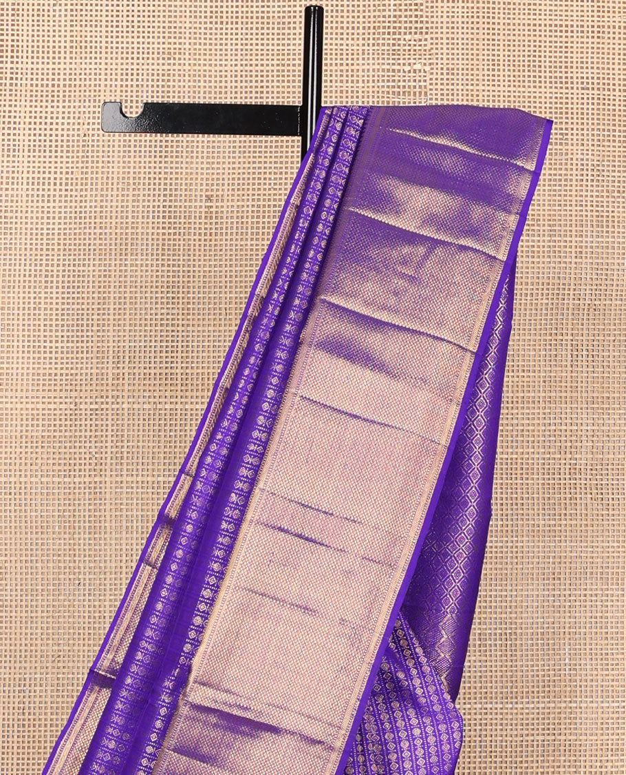 Blue jacquard silk saree, zari border of rekku, muthu, banaras & mayil kann & zari-rich pallu of jaal design