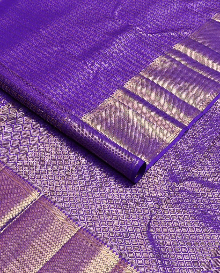 Blue jacquard silk saree, zari border of rekku, muthu, banaras & mayil kann & zari-rich pallu of jaal design