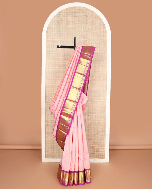 Peach Meena manga buttas kanchipuram silksaree, contrast one-sided korvai border & pallu of salngai,lavangam & mayil designs