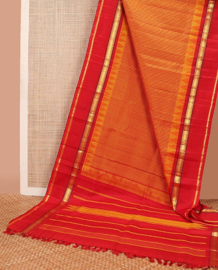Orange micro-checked kanchipuram silk saree, contrast thazampoo rekku rettai pettu border of muthu & kathir designs & pillaiyar mokku pallu