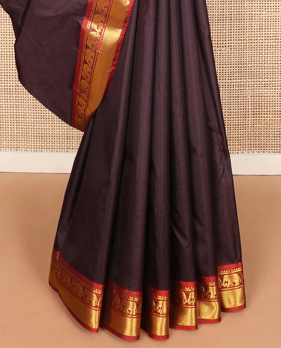 Chocolate brown plain silk saree, contrast border of rekku,banaras,mayil & mayil kann designs & zari striped pallu