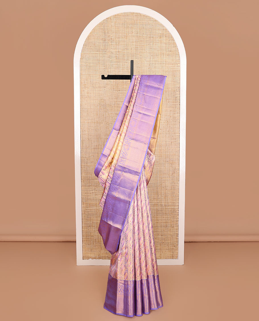 Pink Kanchipuram Tissue Silk Saree, Mesmerized with Jacquard Design on Its Body, Complemented by a Contrast Border of Thilakam, and Dhavana Kodi Designs, Pallu Steeped with Poun Designs, and Paired with a Contrast Blouse