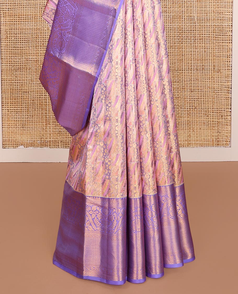 Pink Kanchipuram Tissue Silk Saree, Mesmerized with Jacquard Design on Its Body, Complemented by a Contrast Border of Thilakam, and Dhavana Kodi Designs, Pallu Steeped with Poun Designs, and Paired with a Contrast Blouse