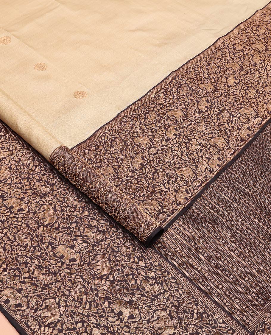 Blue checked Kanchipuram designer saree, big marigold floral motifs woven border, and intricate pallu