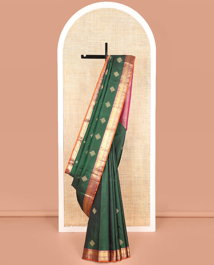 Green Kanchipuram Soft Silk Saree Artfully Detailed with Kolam Buttas, Complemented by a Contrast Border of Thilakam Mokku, Muthu, Yaanai, and Mayil Designs, Zari-Rich Pallu of Mayil Kann Designs, and Paired with a Contrast Blouse