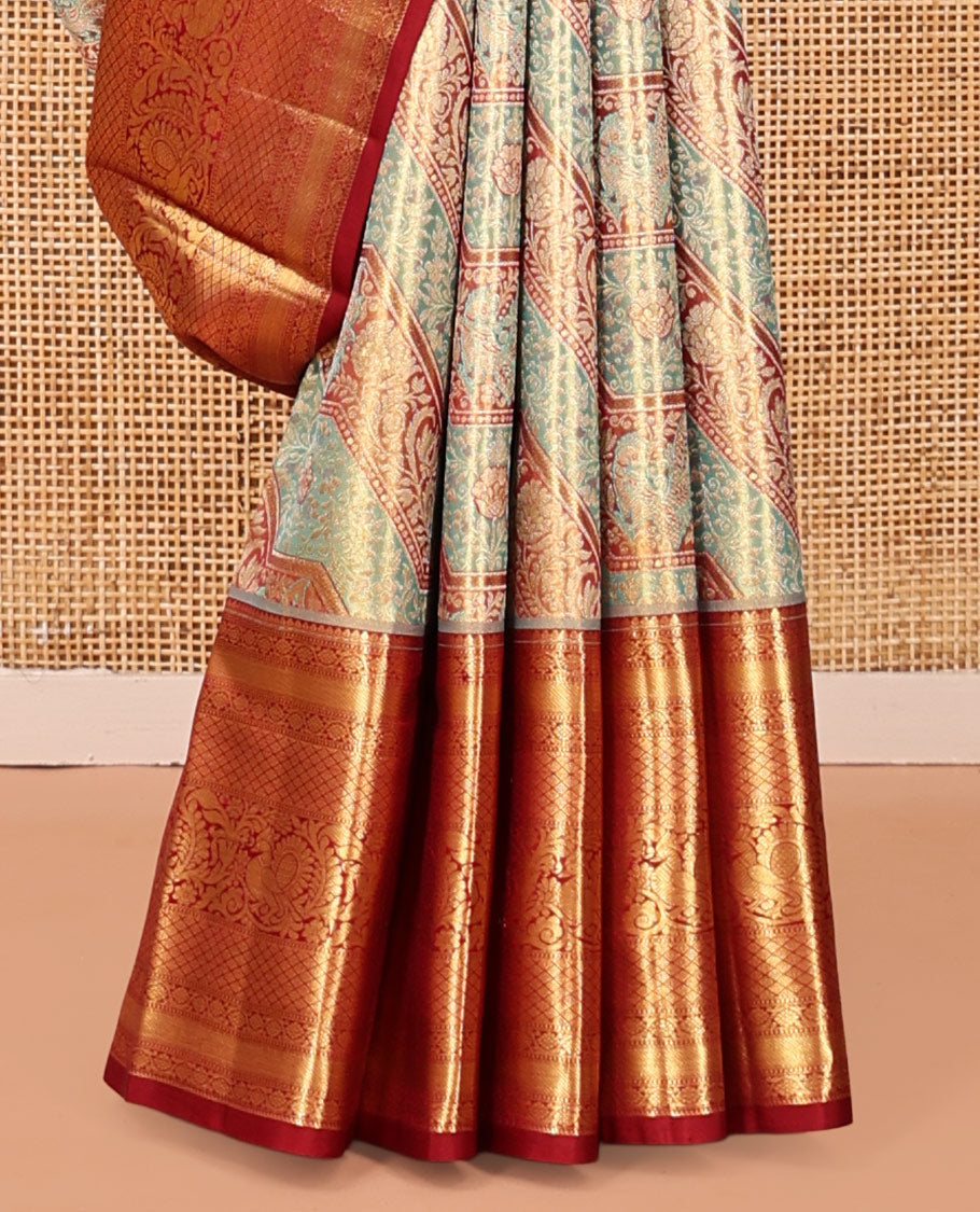 Blue Kanchipuram Tissue Silk Saree, Beautifully Bedecked with Meenakari Jacquard, a Contrast Border of Kodi Visiry, Jaal, and Mayil Designs, Diagonal Striped Pallu, and Contrast Blouse