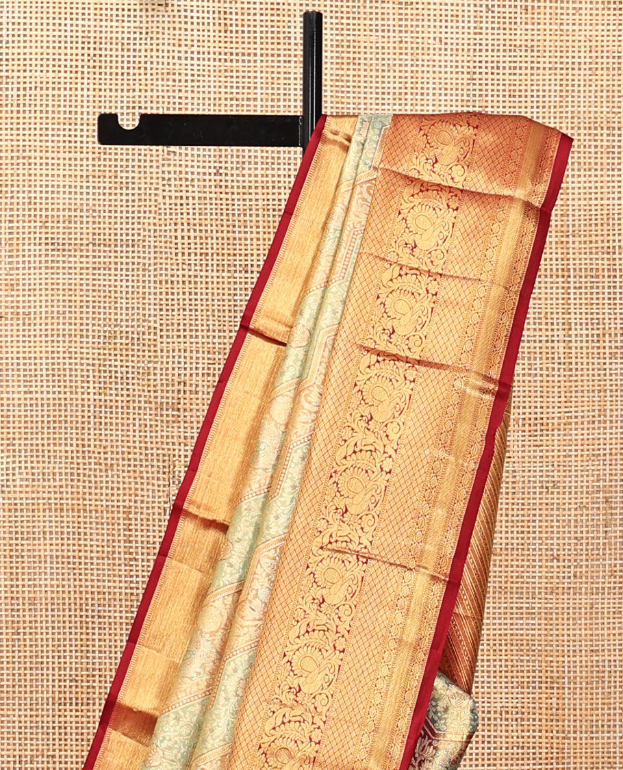 Blue Kanchipuram Tissue Silk Saree, Beautifully Bedecked with Meenakari Jacquard, a Contrast Border of Kodi Visiry, Jaal, and Mayil Designs, Diagonal Striped Pallu, and Contrast Blouse