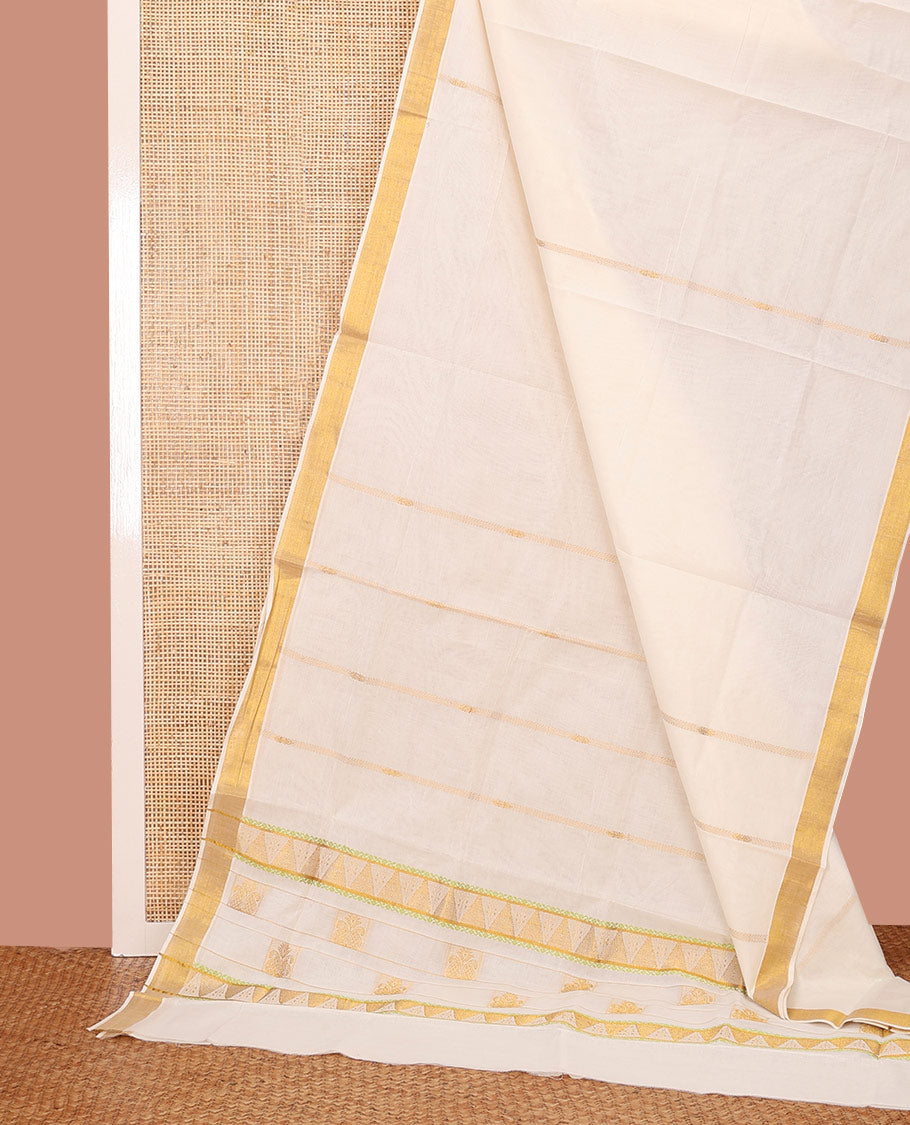 Cream Kerala Saree, Decked Up with Zari Stripes on Its Body, Subtly Sparkled Bavanji Border, Pallu Zari Woven with Temple and Paisley Designs, and Paired with a Matching Blouse