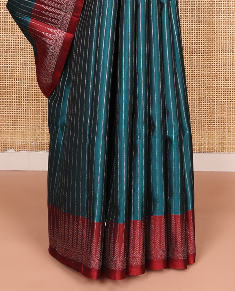 Blue muthu striped soft silk saree, contrast tree motifs border, and pallu of geometric patterns