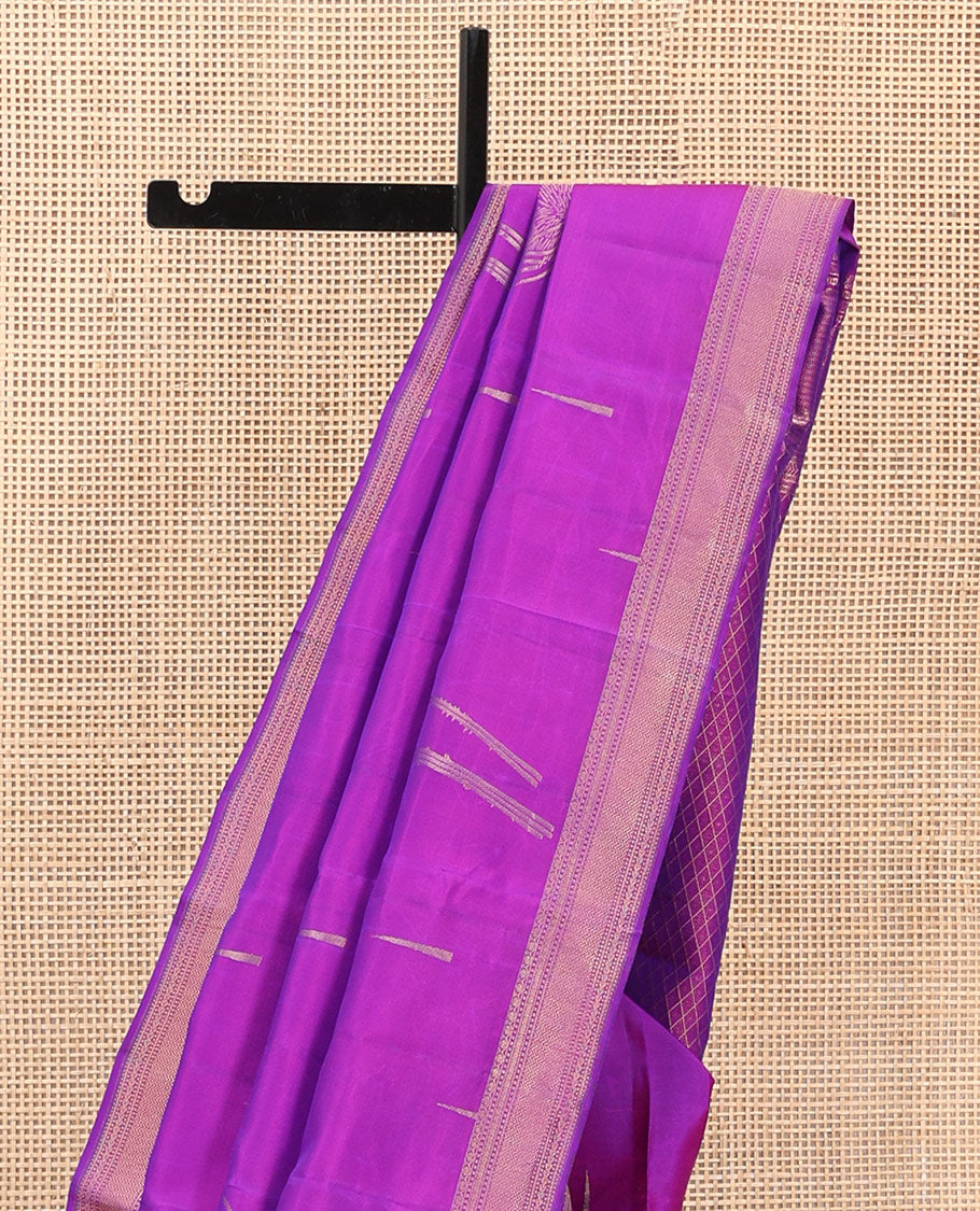 Violet Vasundhara Silk Saree Accentuated with Thazampoo Rekku, and Vel Buttas, Complemented by Zari Border of Manga, Muthu, Kathir, Neli, and Vanki Designs, Pallu Adorned with Jaal Designs, and Paired with a Matching Blouse