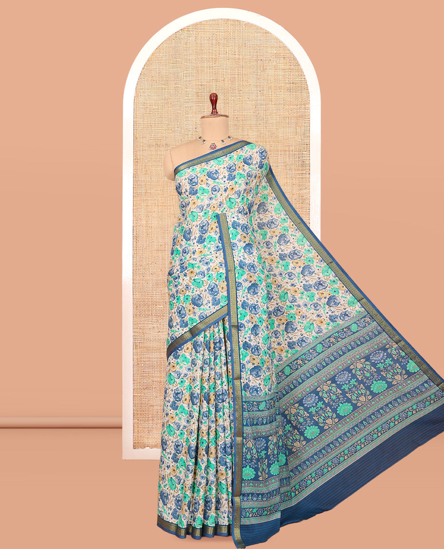Blue Printed Silk Saree, Graced with Floral Print, a Traditional Zari Border, Floral Pallu, and a Matching Blouse