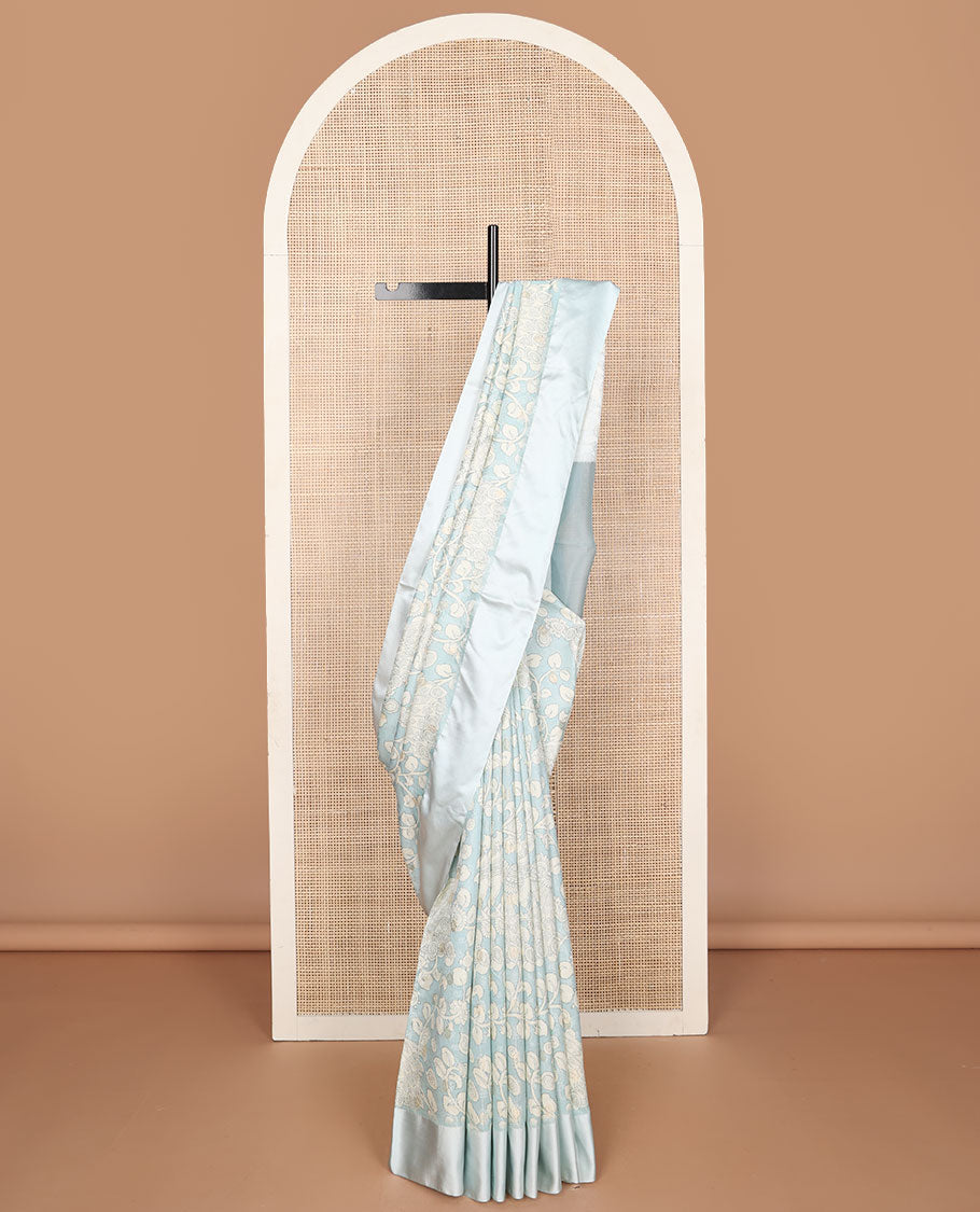 Blue kalamkari-style floral vine & peacock printed tussar saree with zari buttas, plain border & plain pallu
