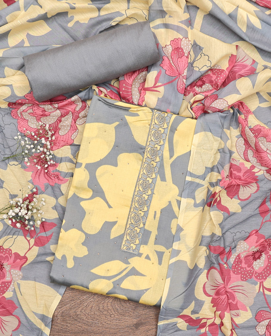 Grey and Yellow Material Chudidar Set, Decked Up with Silhouette-Style Floral Print, and Stone Work on Its Rayon Top, a Plain Rayon Bottom, and Paired with a Floral Printed Rayon Dupatta