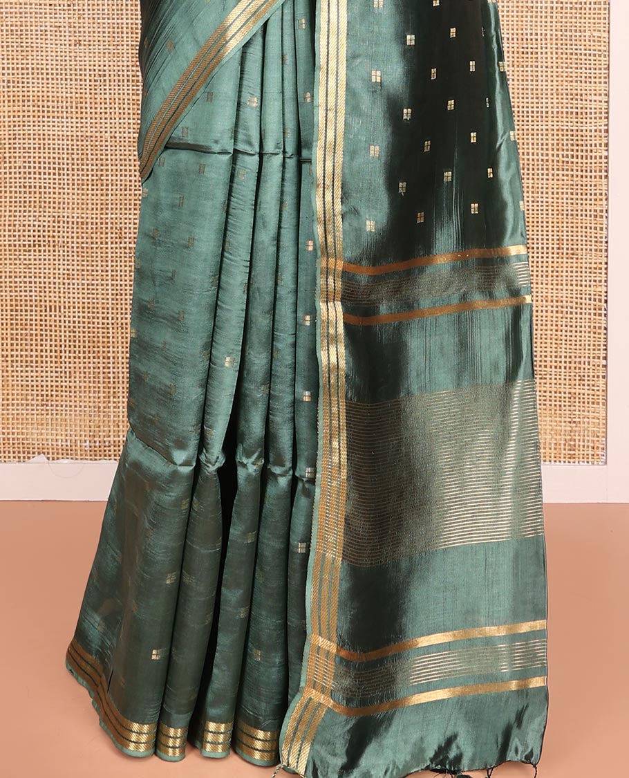 Green Banana Pith Saree Prettified with Square-Shaped Zari Buttas, Subtly Woven Zari Piping Border, Pallu Gleamed Up with Zari Stripes, and Paired with a Matching Blouse