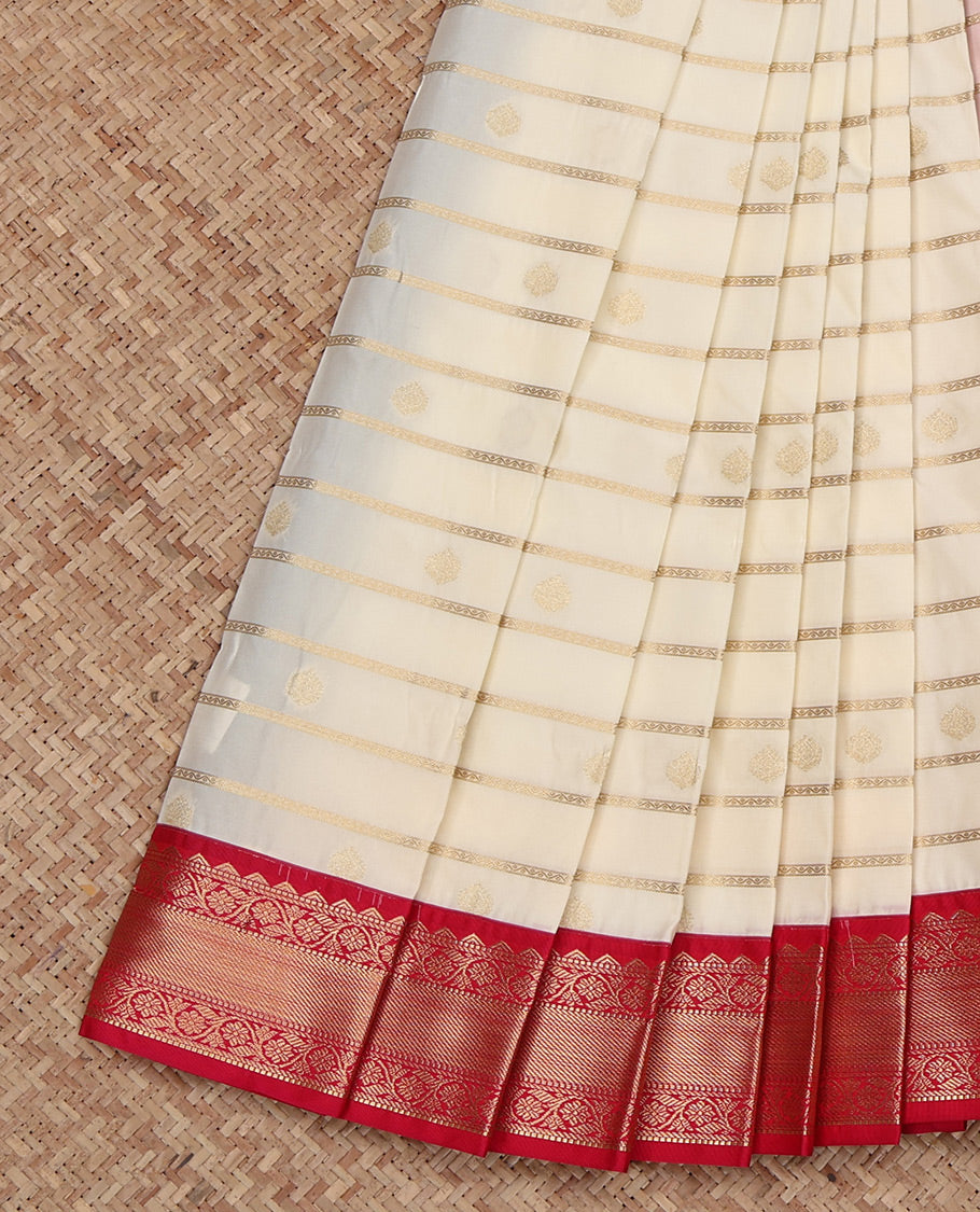 Cream Budget Silk Saree, Delicately Woven with Zari Buttas and Zari Stripes All Over Its Body, Complemented by a Contrast Traditional Zari Design Border, Grand Jaal Pallu, and Paired with a Contrast Blouse