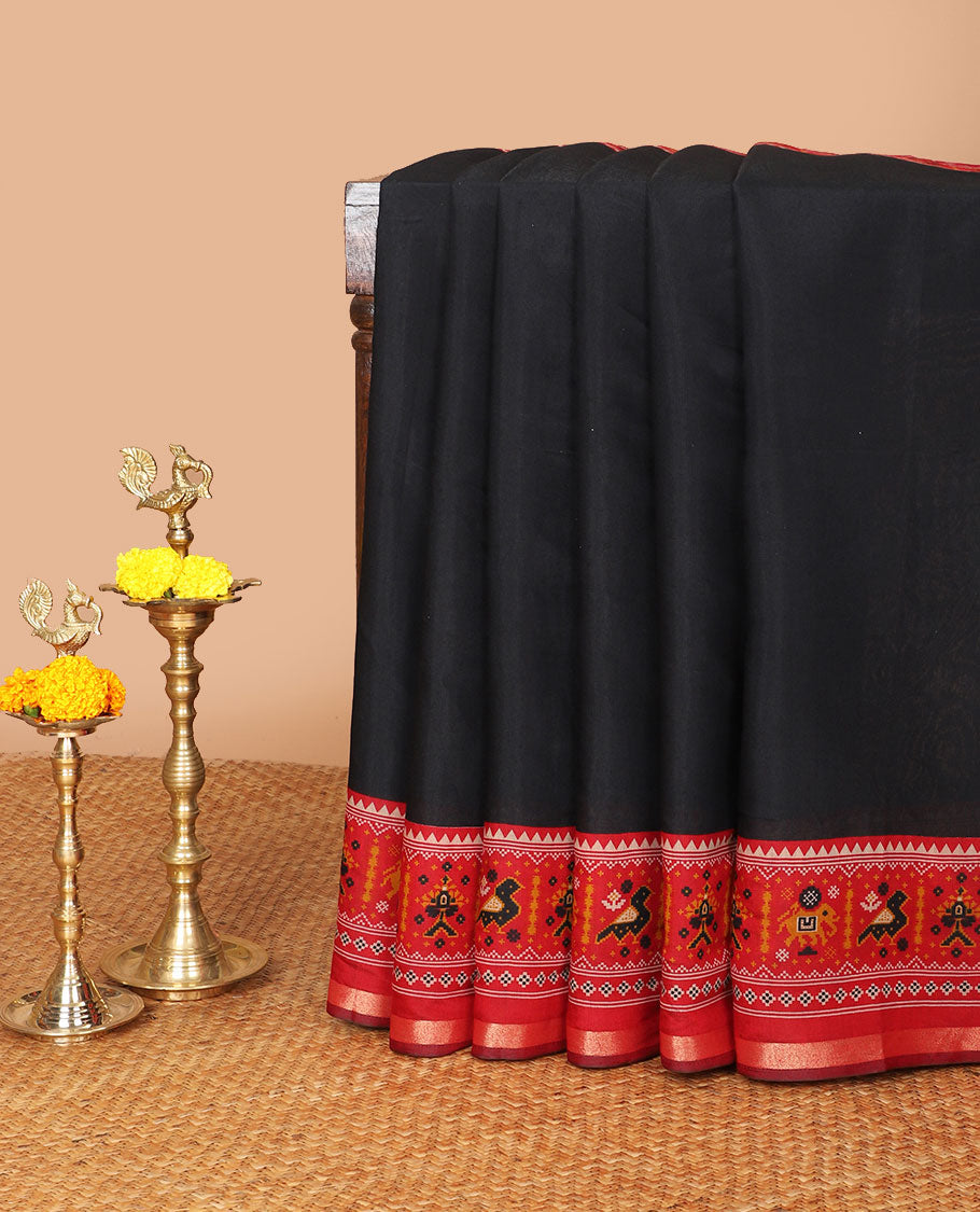 Black muslin silk saree with pochampalli border & pochampalli design pallu along with butta design blouse