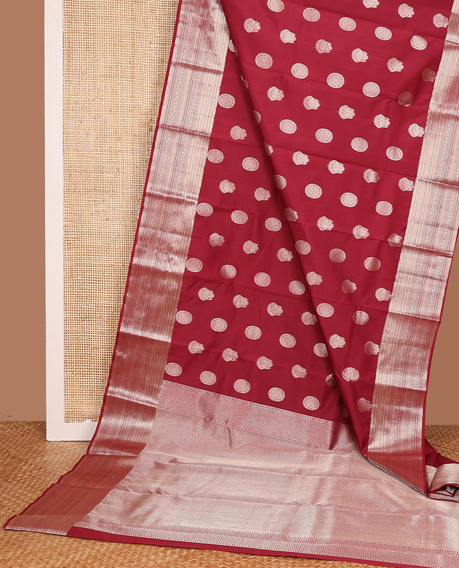 Maroon iruthalai pakshi and chakram Vasundhara silk mix, traditional motifs zari woven border, and vanki pallu