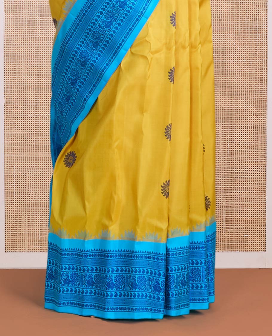 Yellow sunburst-style buttas gadwal silk saree, contrast traditional design border & pallu of jaal designs