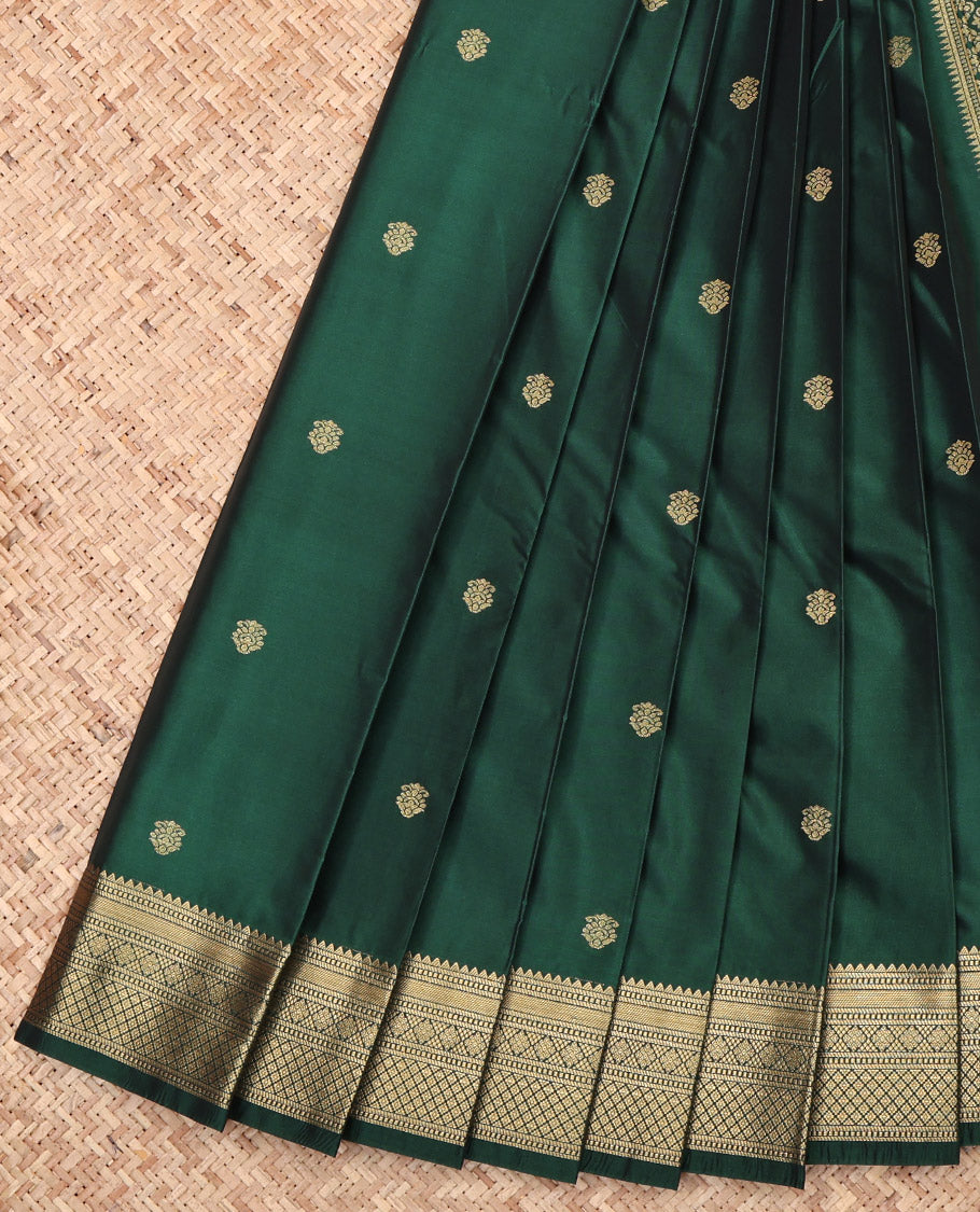 Green Budget Silk Saree Showcasing Zari Buttas, Highlighted by a Traditional Zari Border, Intricate Pallu, and a Matching Blouse