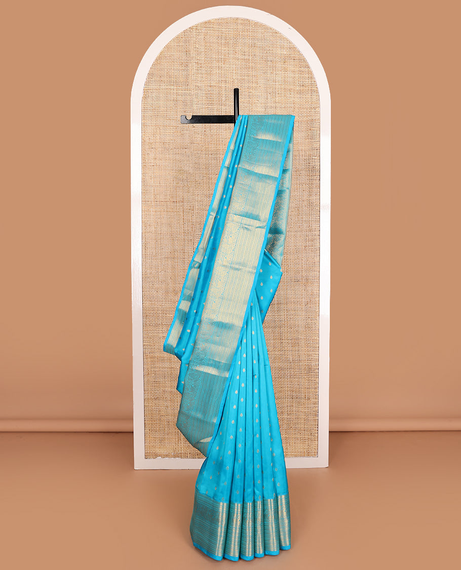 Blue zari buttas Vasundhara silk mix, traditional zari border of mayil, yaali, and muthu designs and paiyaadi kattam pallu